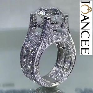 Joancee Round Cut White Sapphire 925 Sterling Silver Engagement Ring